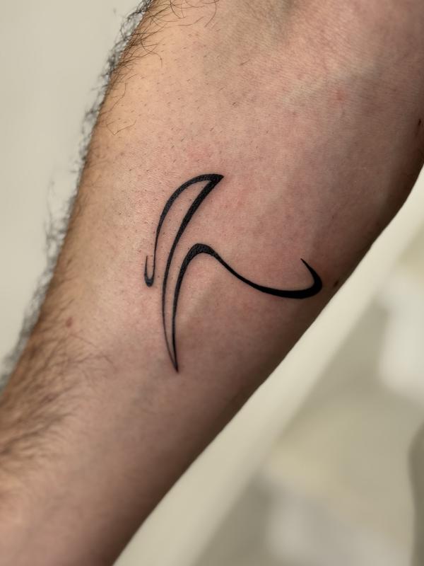 Fineline Abstract Pickaxe Tattoo
