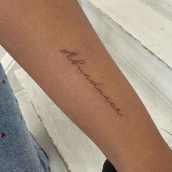 Fineline Script Tattoo